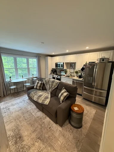 A tidy apartment living and kitchen area, perfectly prepared by the Brighthouse Cleaners move-in / move-out cleaning service.